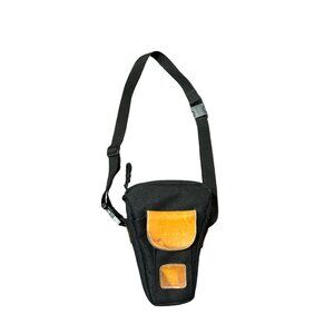 Camera Case With Adjustable Strap & Front Pocket For Adventurous Photographers